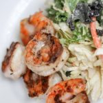 Weight Loss Surgery friendly recipes for a fresh and yummy Kale Salad using Sautéed Shrimp and Caesar Dressing! A fun spin on a classic caesar salad high in protein and flavor. #gastricsleeverecipes #gastricbypassrecipes #wls #duodenalswitch #bariatric