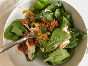Super simple taco salad that can be made in advance and packed for lunches in a mason jar! I keep the meat separate so I can heat it up and add it all together. Great for bariatric lunches. #bariatriclunch #wlslunch #gastricsleevelunch #gastricbypasslunch #saladinajar