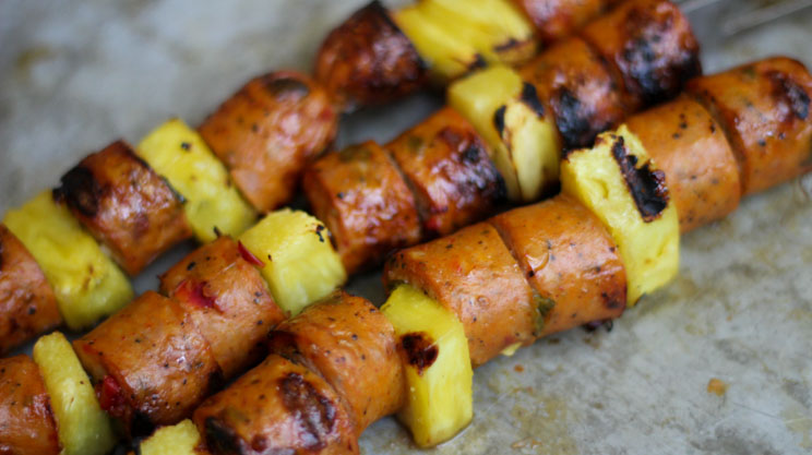 Pre-cooked chicken sausage with fresh pineapple chunks threaded on skewers and grilled for low carb bariatric surgery recipe