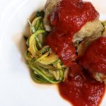 Ground Turkey with fresh Pesto and grated parmesan cheese baked meatballs with marinara sauce and zucchini noodles from Bariatric Food Coach